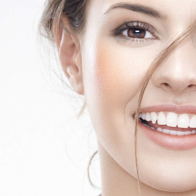 Face of a smiling brown-eyed woman - Personal Care - AAK