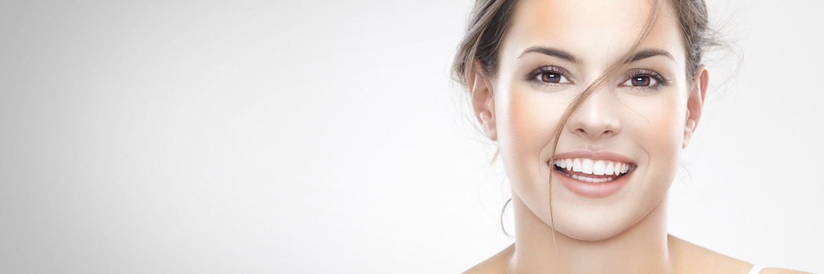 Face of a smiling brown-eyed woman - Personal Care - AAK