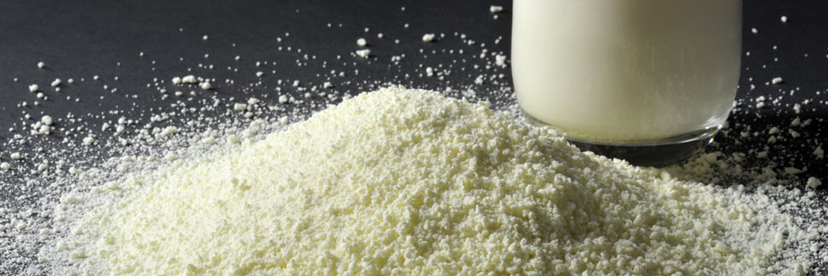 Milk powder and a glass of milk - Dairy and Ice cream - AAK