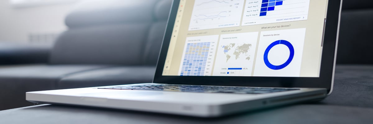 Co-Workers Pointing At Financial Documents - Investors- AAK