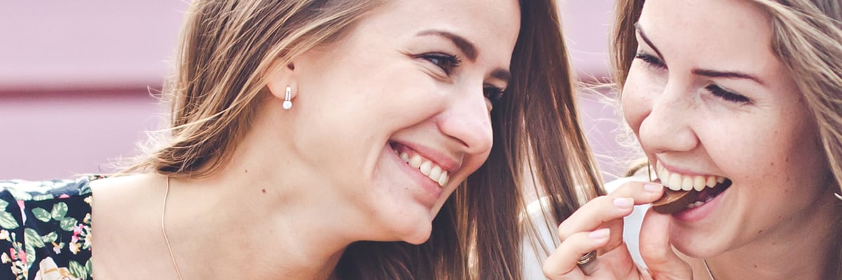 Smiling Women Eating Chocolate - Chocolate and Confectionery - AAK