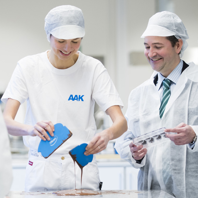 Co-Workers Are Making Chocolate Together in a Workshop - Careers - AAK